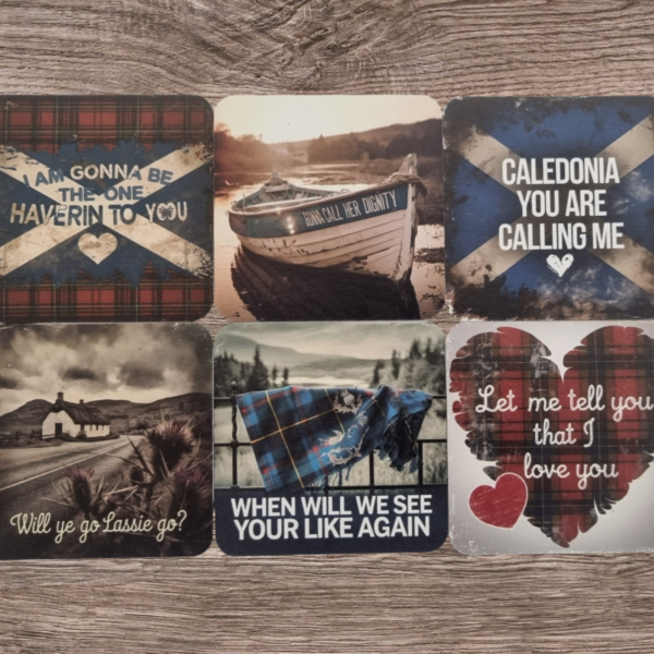 A set of four Scottish music lyric beer mats featuring bold fonts, classic song quotes and textured backgrounds