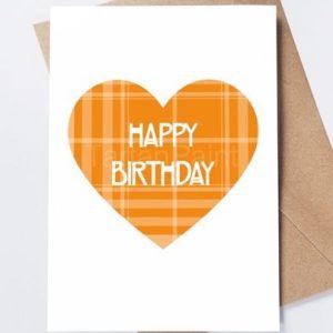 Orange tartan heart with ‘Happy Birthday’ text on a white card background