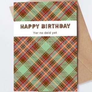 Yer no dead yet birthday card. Red and green tartan background