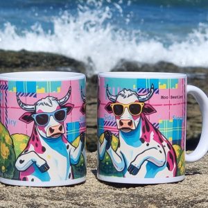Two colourful Highland cows with ice creams printed on a funny Scottish mug