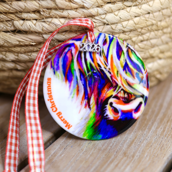 Maggie the Coo Christmas bauble with a silver 2026 charm on gingham ribbon