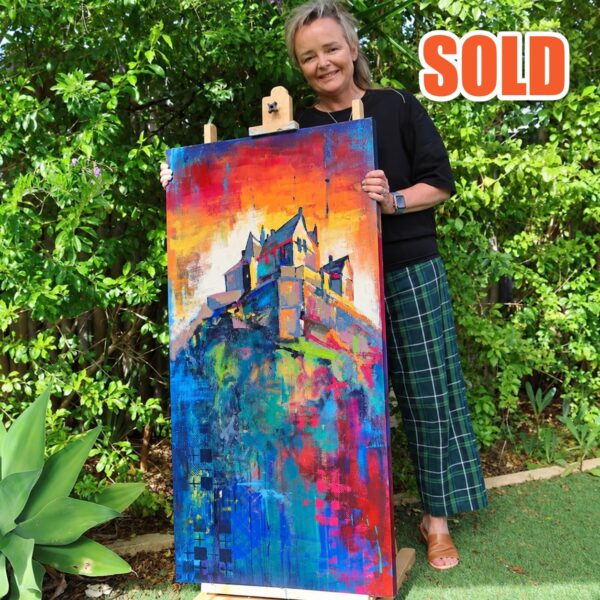 Caroline Speirs with her original Edinburgh Castle painting on an easel in her Perth garden, marked sold