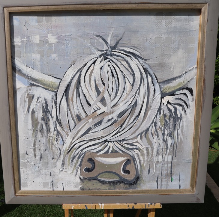 Iona, an original Highland cow painting by Tartan Paint, in a distressed pale grey frame with a slim gold slip