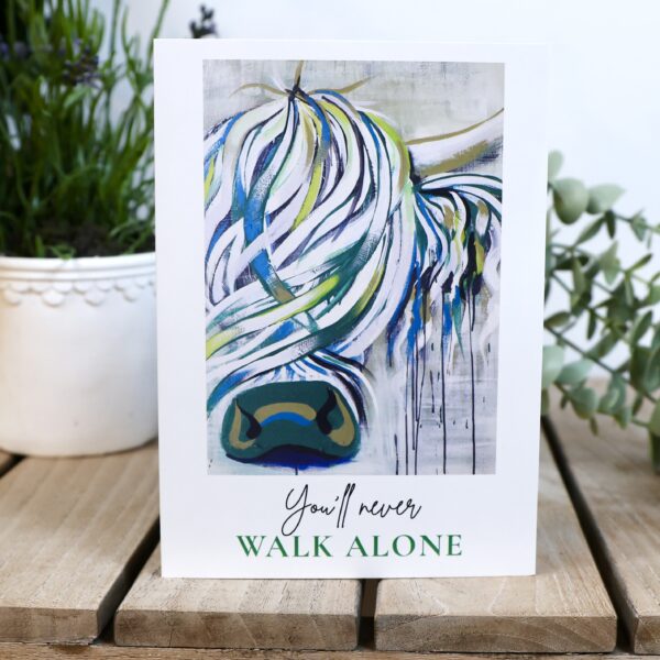 You'll Never Walk Alone card, white Highland cow painted in teal, blue and lime green, Tartan Paint encouragement card