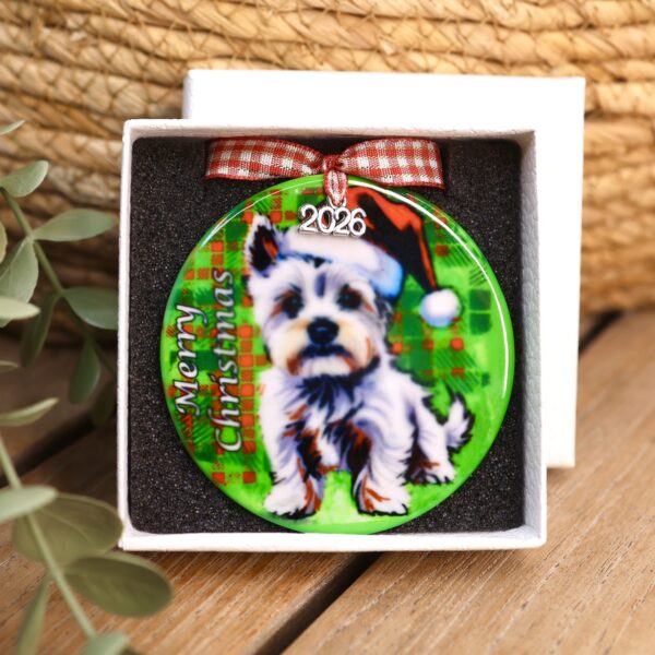 Westie in a Santa hat 2026 Christmas bauble on green tartan in its gift box